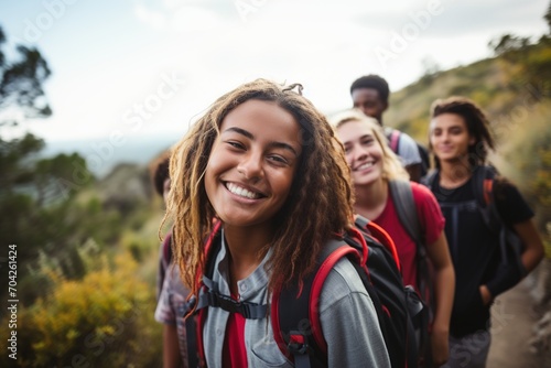 Diverse group of friends hiking in the mountains