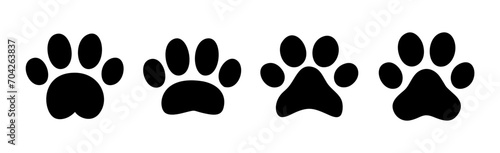 Paw icon vector illustration. paw print sign and symbol. dog or cat paw photo