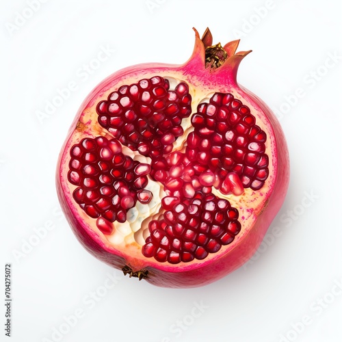 Photograph of pomegranate, top down view, wite background