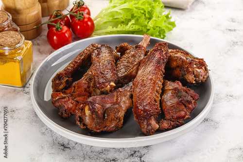 Roasted duck wings with sauce