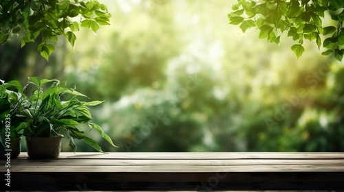 Empty wood table and defocused bokeh and blur natural outdoor background.