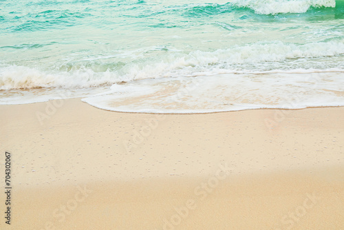 Travel Sea Nature Concept, Shore Sand Water Blue Ocean blur Background, View Calm Texture Wave Surface Beach with Horizon, Island Beautiful Landscape for Card Tourism Holidays Vacation Relax Tropical.