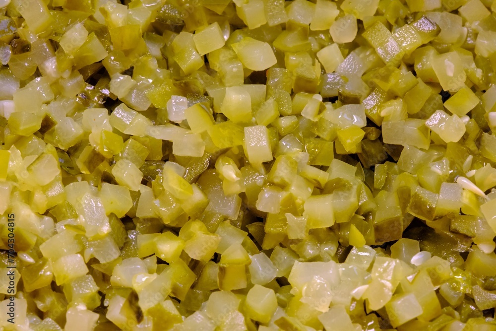 Cut a large amount of pickled cucumber into small cubes Cut a large amount of pickled cucumber into small cubes