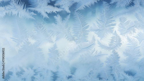 Abstract Winter frosty pattern on glass, background texture. Frozen background. Ice crystals or cold winter background. frozen ice texture. © Bogdan