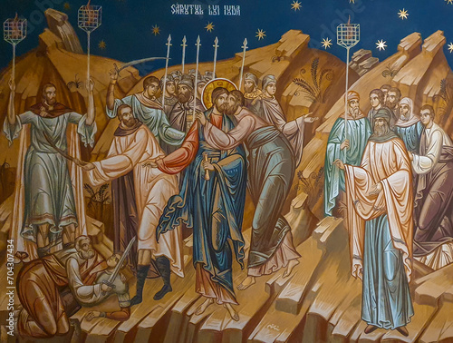 Foto The painting on the wall representing the kiss of Judas