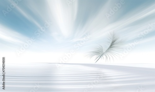 White feather floating on a white ocean under a blue sky