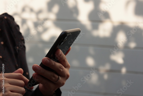 person using mobile phone