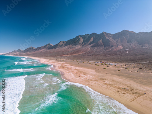 The drone aerial view of Cofete beach in Fuerteventura Island, Canary Islands, Spain. Playa de Cofete, one of the best beaches in Fuerteventura.