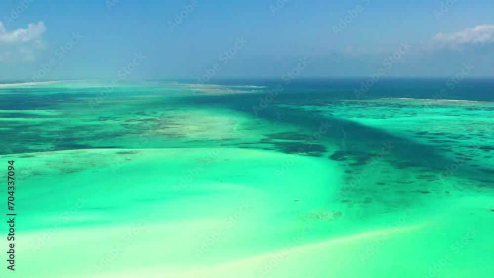 Aerial view of the Indian Ocean water hitting the Tanzanian coast. Aerial view of the Indian Ocean water hitting the Tanzanian coast.
