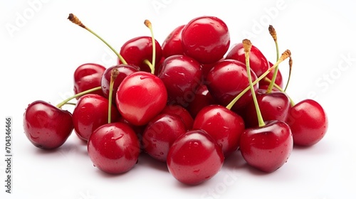 Bountiful harvest: fresh red cherries piled high on white background - vibrant and juicy fruit stock photo 