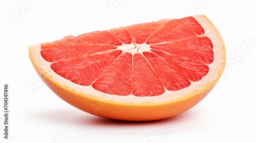 Succulent citrus delight: vibrant slice of fresh grapefruit isolated on white background – refreshing fruit photography for licensing 