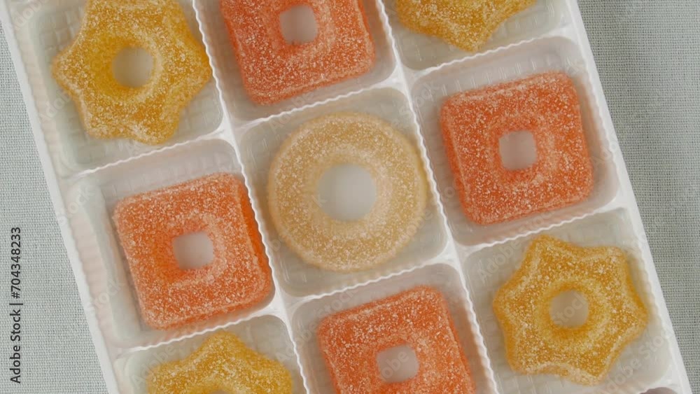 Assorted marmalade sweets in a box. Assorted marmalade sweets in a box.