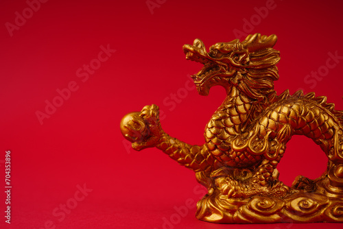 Wallpaper Mural Chinese golden dragon statue on a red background. Torontodigital.ca