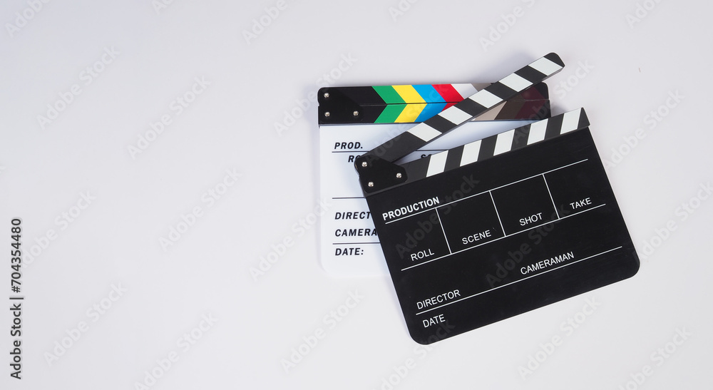 Two Clapper board or movie slate on white background..