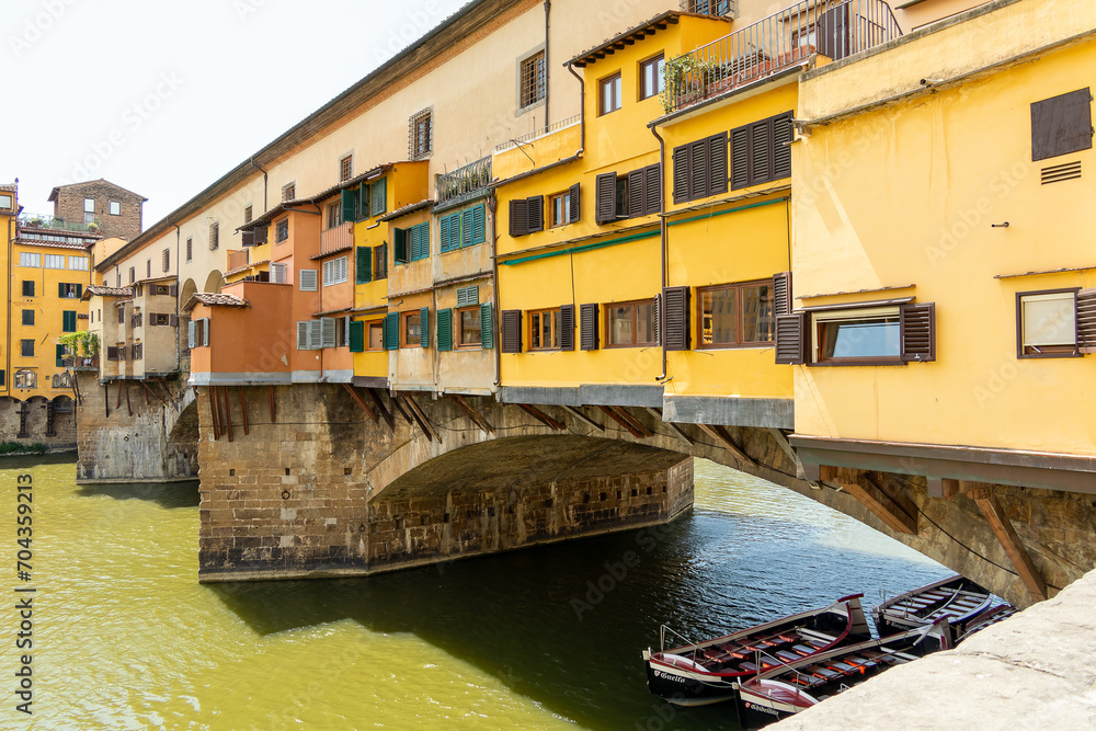 Florence, Italy, July 25, 2023. Ponte Vecchio is a shopping arcade and pedestrian street.