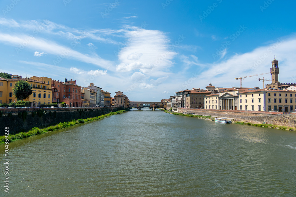 Fototapeta premium Florence, Italy, July 25, 2023. Ponte Vecchio is a shopping arcade and pedestrian street.