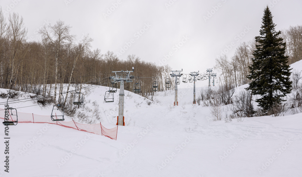 winter ski resort in Kazakhstan, a lot of snow in the mountains and green spruce trees