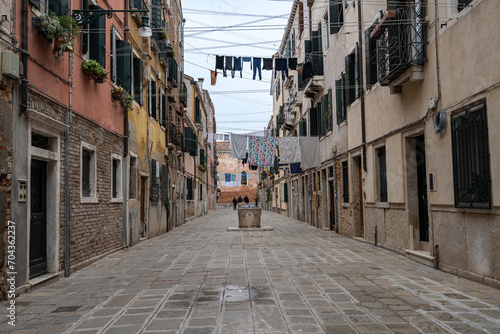 Venezia - Biancheria ad asciugare in una calle di Castello photo
