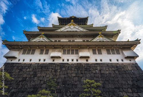 Osaka's landmark Osaka Castle castle tower that shines in the blue sky