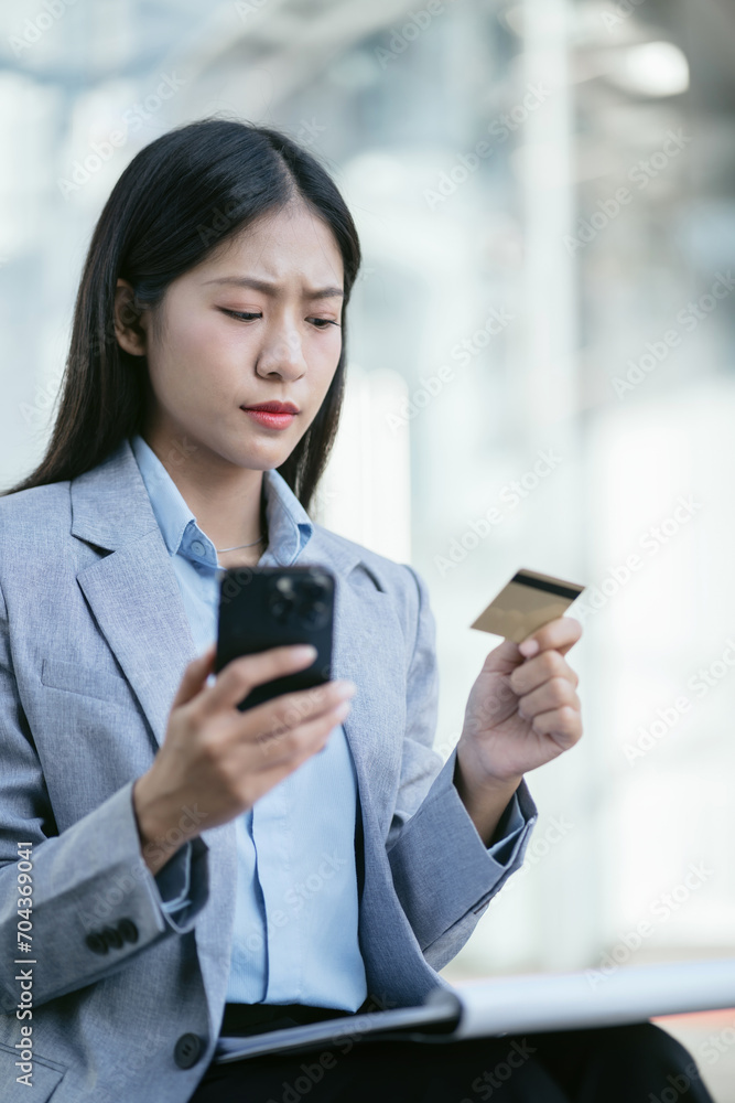 Business woman stressed with credit card debt, unemployment stress businessman sitting on stairs. Business woman stressed with credit card debt, unemployment stress businessman sitting on stairs.