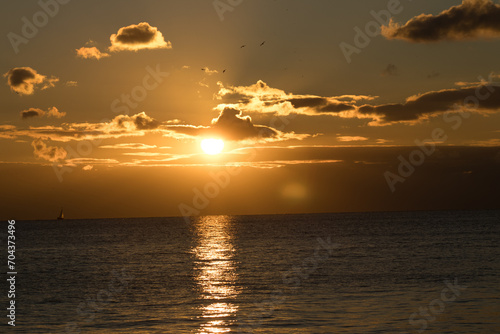 sunset over the sea © Hasan