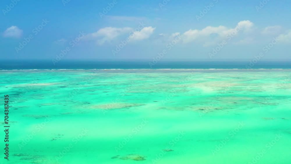Shallow water of the Indian ocean set under the clear sky. Shallow water of the Indian ocean set under the clear sky.