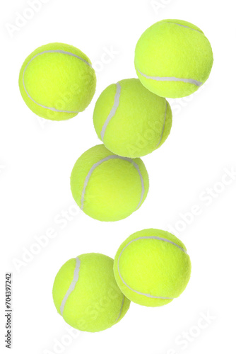 Many tennis balls flying on white background © New Africa