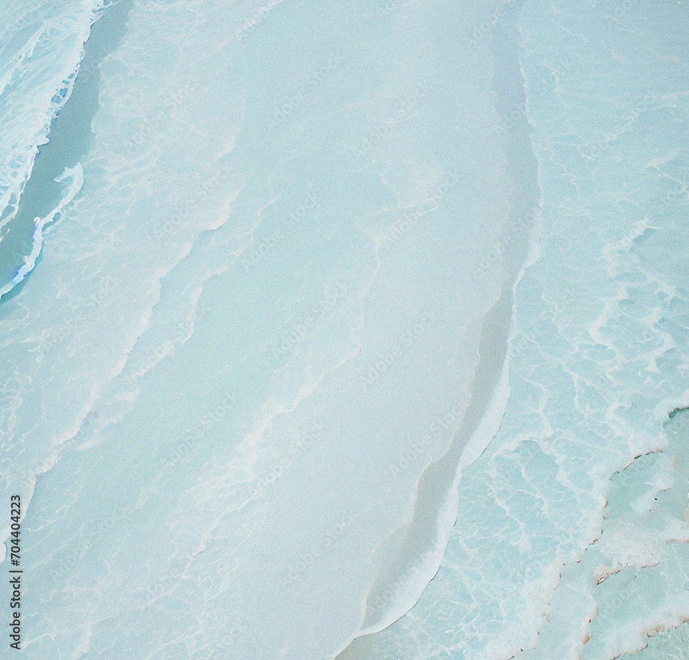 abstract white sand beach with transparent water wave from above, calm rippled water surface background concept with space for text or product presentation abstract white sand beach with transparent water wave from above, calm rippled water surface background concept with space for text or product presentation