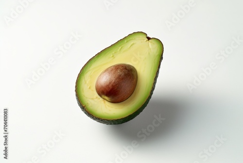 fresh avocado in half cut isolated on white background. generative ai