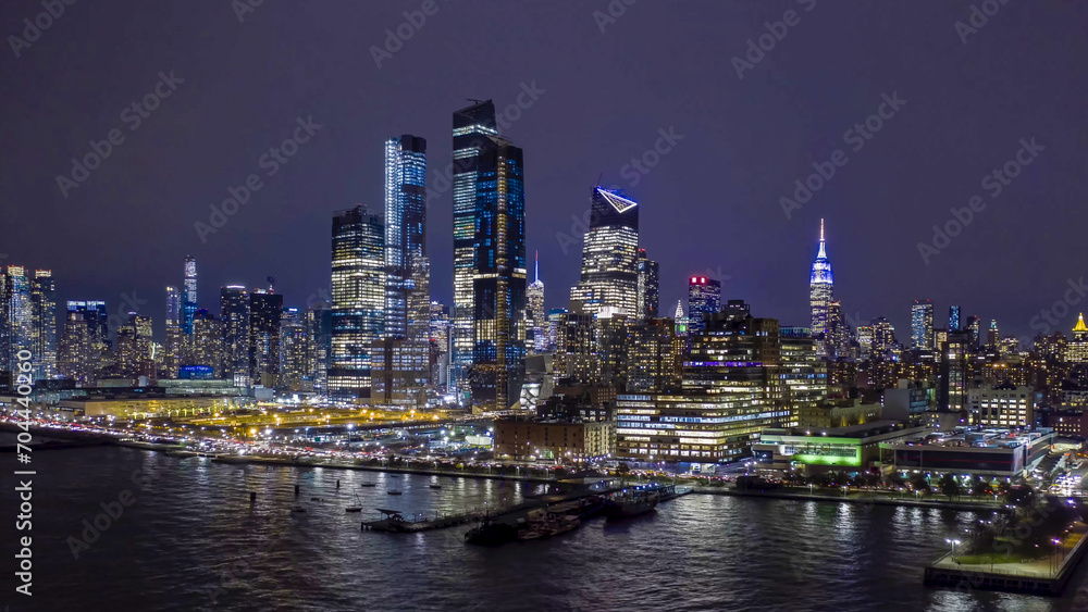 new york city skyline at night, view over the river hudson
