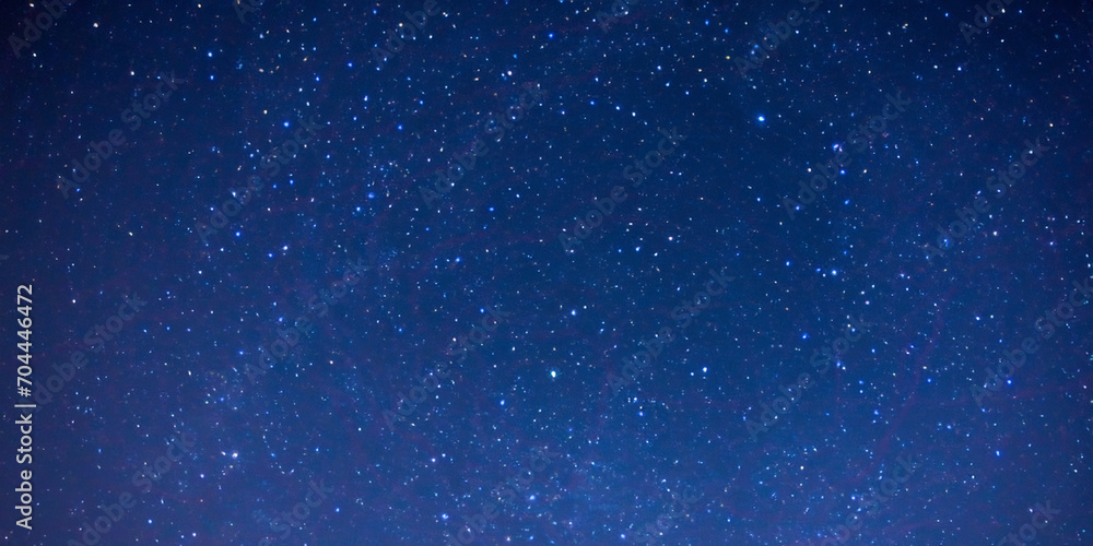 Obraz premium Starry night in dark blue sky background