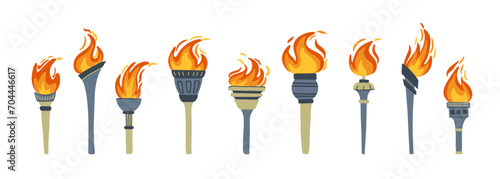 Set of olympic torches with burning fire. Flat style vector illustration