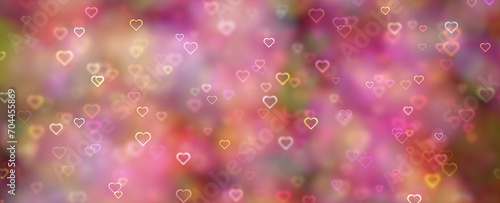 Colorful bokeh with heart symbols illustration background. Valentine's day holidays copy space greeting card.