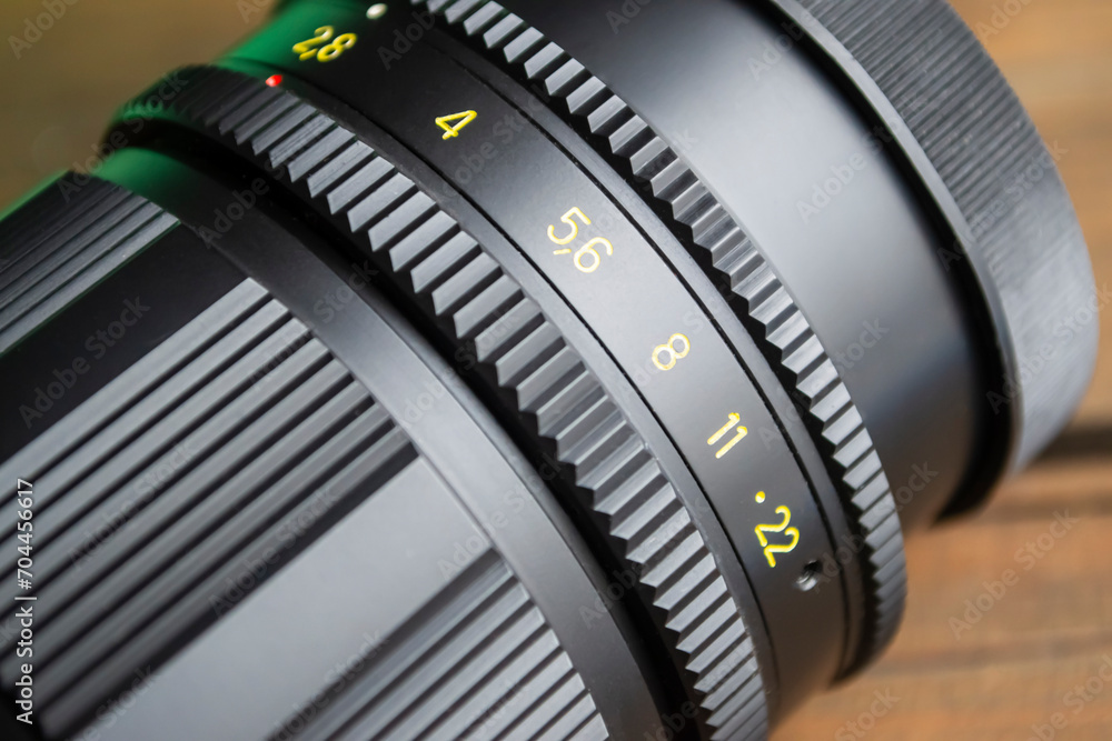 Close-up lens. Black lens. Close-up numbers on the lens. Close-up lens. Black lens. Close-up numbers on the lens.