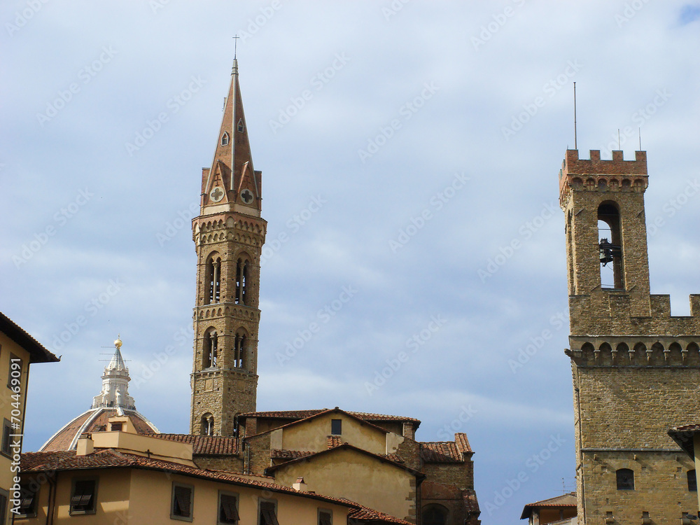 View of the Fiorentina Abbey Tower on a day. Close-up. Florence. Italy.