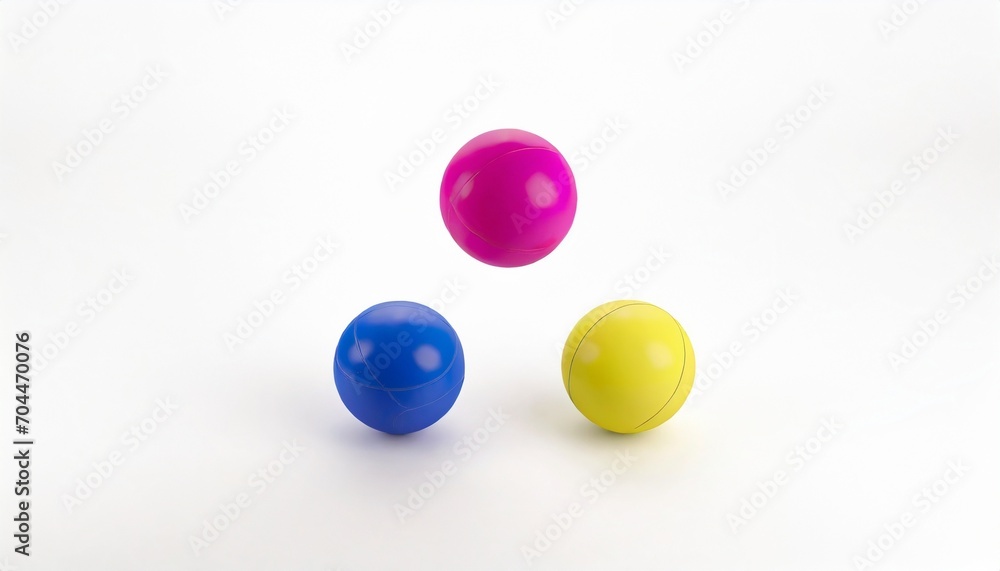 three juggling balls in a studio white background