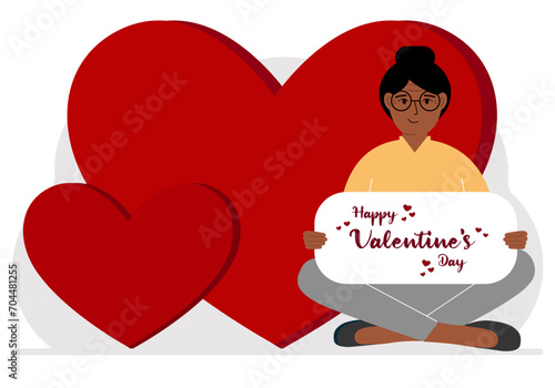 A woman holds a Happy Valentine's Day greeting against a background of red hearts.
