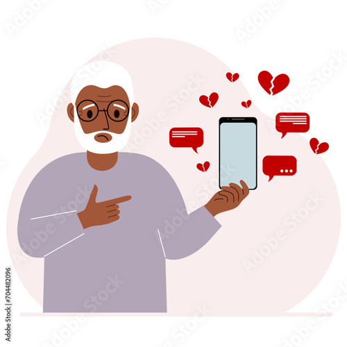 A man with a smartphone in his hand. The concept of correspondence, communication, social networks. Lots of broken hearts.