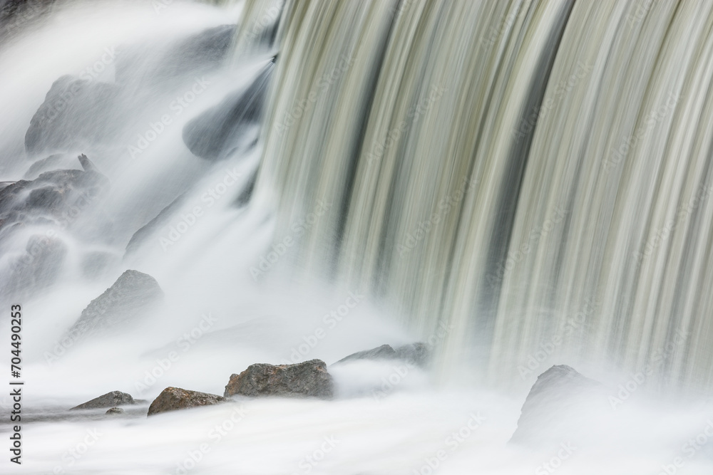 Landscape captured with motion blur of a cascade on the Rabbit River, Michigan, USA Landscape captured with motion blur of a cascade on the Rabbit River, Michigan, USA