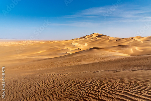 Landscape of Erg Admer in the Sahara desert  Algeria. A view of the dunes and ripples dug by the wind in the sand.