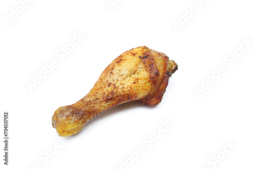 Roasted and marinated chicken drumstick thigh leg isolated on white background