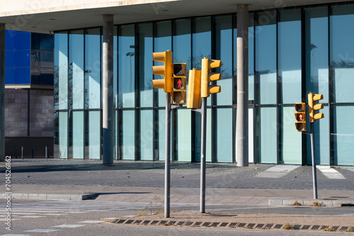 Traffic light in a modern financial district in Barcelona in Spain photo