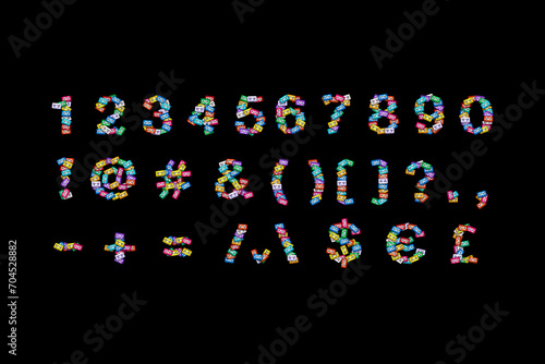 Top view of the numbers and symbols alphabet made of colorful retro audio cassettes scattered on a black background. The concept of music theme gift cards or disc covers, designers resource