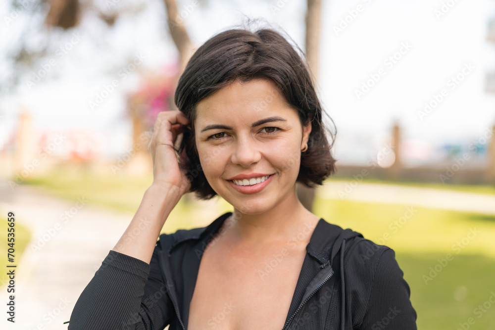 Young pretty Bulgarian woman at outdoors . Portrait Young pretty Bulgarian woman at outdoors . Portrait