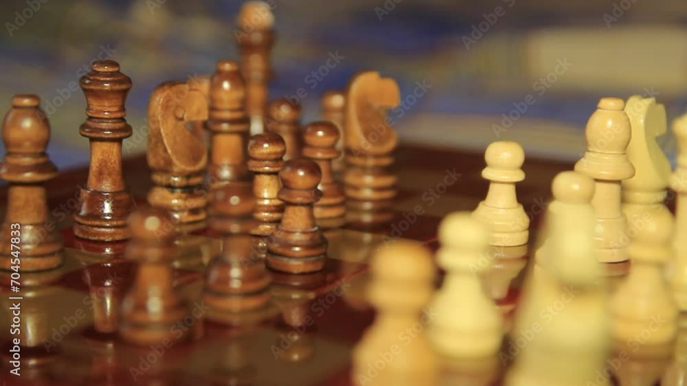 Game of chess. A man's hand moves the figure Game of chess. A man's hand moves the figure