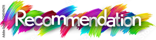 Recommendation paper word sign with colorful spectrum paint brush strokes over white.