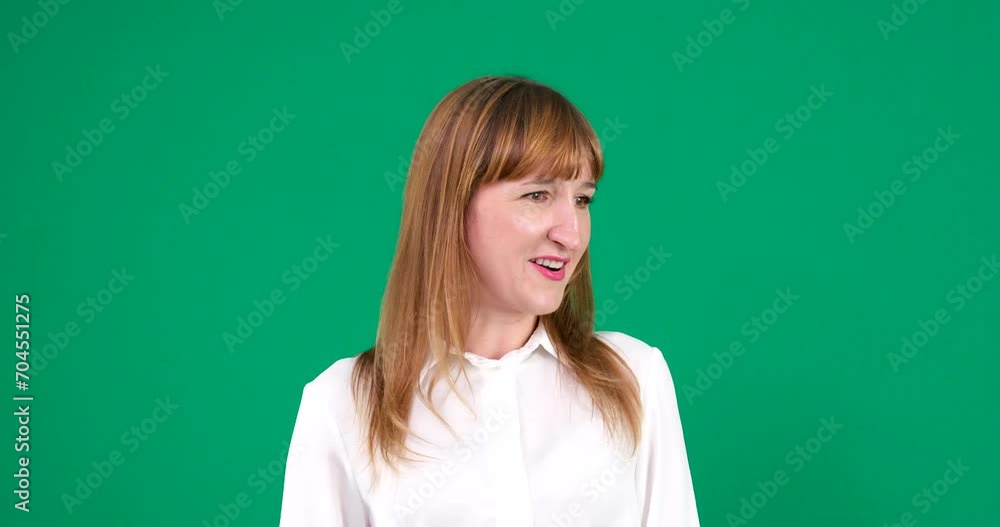 Happy smiling young business woman on Green Screen, Chroma Key. young woman on a green background in a chroma key studio emotions close-up Light skin European American. Canadian Happy smiling young business woman on Green Screen, Chroma Key. young woman on a green background in a chroma key studio emotions close-up Light skin European American. Canadian