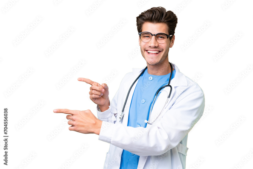 Young doctor man over isolated background pointing finger to the side and presenting a product Young doctor man over isolated background pointing finger to the side and presenting a product