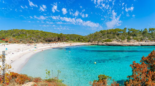 Fototapeta Naklejka Na Ścianę i Meble -  Discover Cala Mondrago's idyllic shores, with soft white sands, clear turquoise waters, nestled in Mallorca's lush Mondrago National Park.
