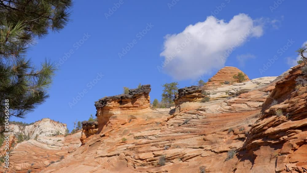 Establishing shot of mountains with red rocks in Zion Mount Carmel Highway, Zion National Park, Utah, North America. Day time. ProRes 422 HQ. Establishing shot of mountains with red rocks in Zion Mount Carmel Highway, Zion National Park, Utah, North America. Day time. ProRes 422 HQ.